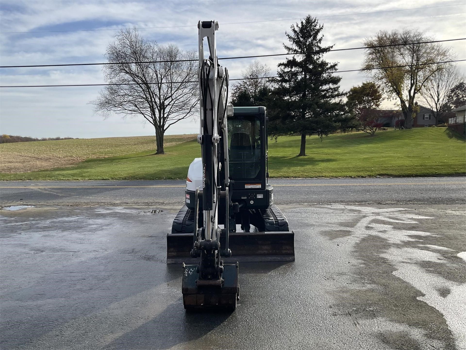 2012 Bobcat E50 — front view with blade and bucket