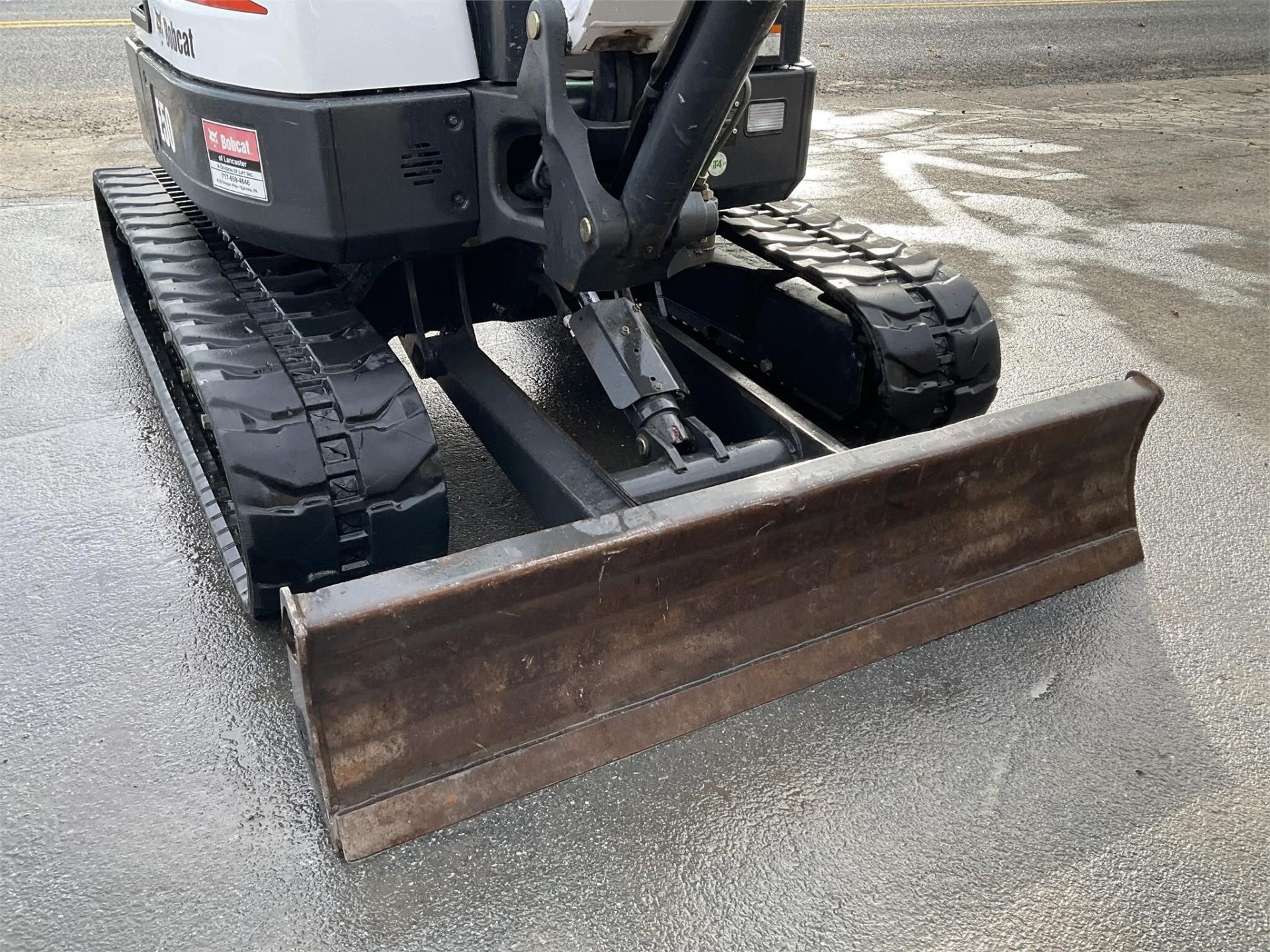 2012 Bobcat E50 — rear blade and tracks detail