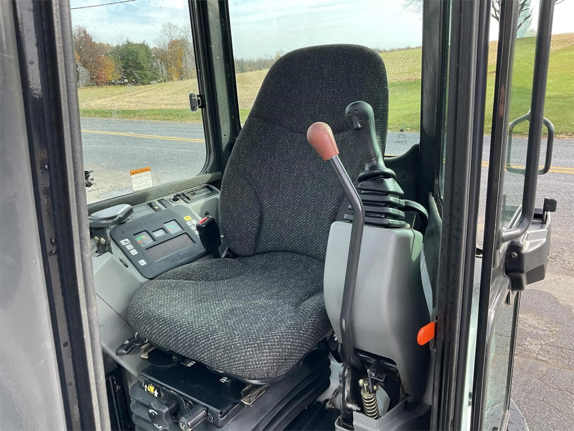 2012 Bobcat E50 — operator seat and joystick controls