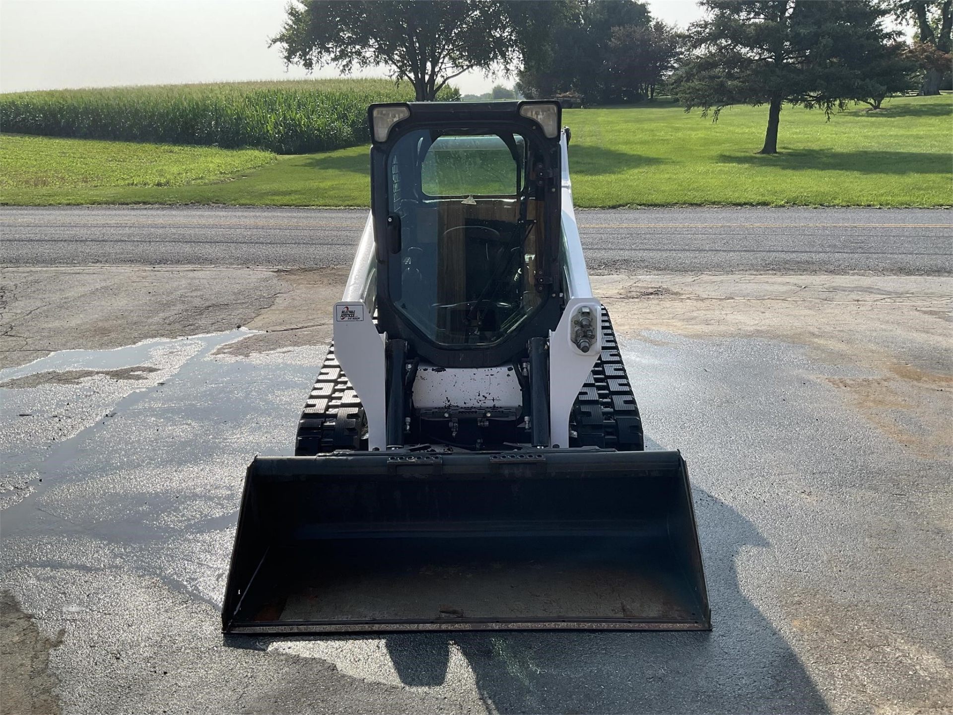 2014 Bobcat T590 — front view with bucket