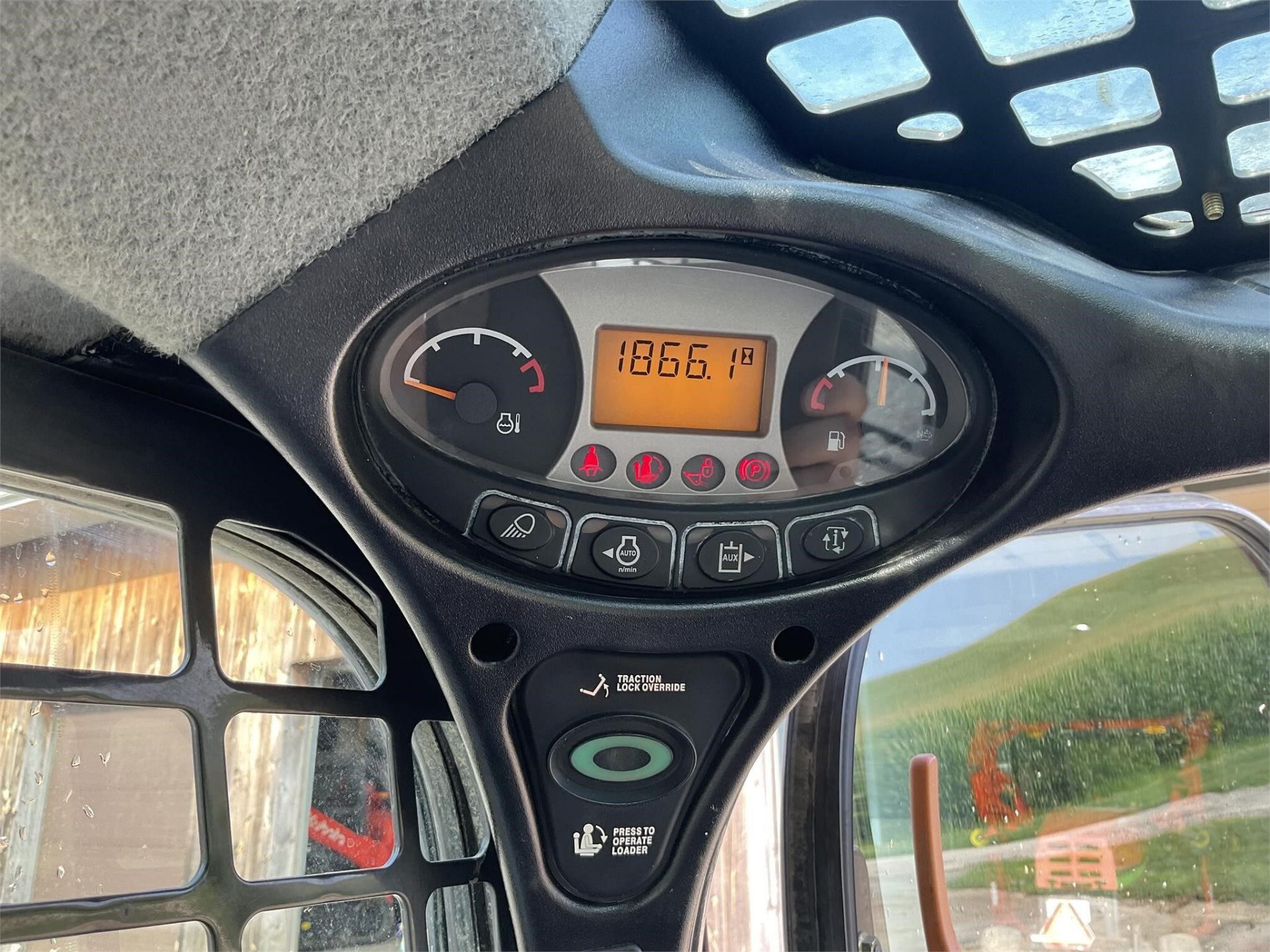 2014 Bobcat T590 — instrument cluster showing 1866 hours